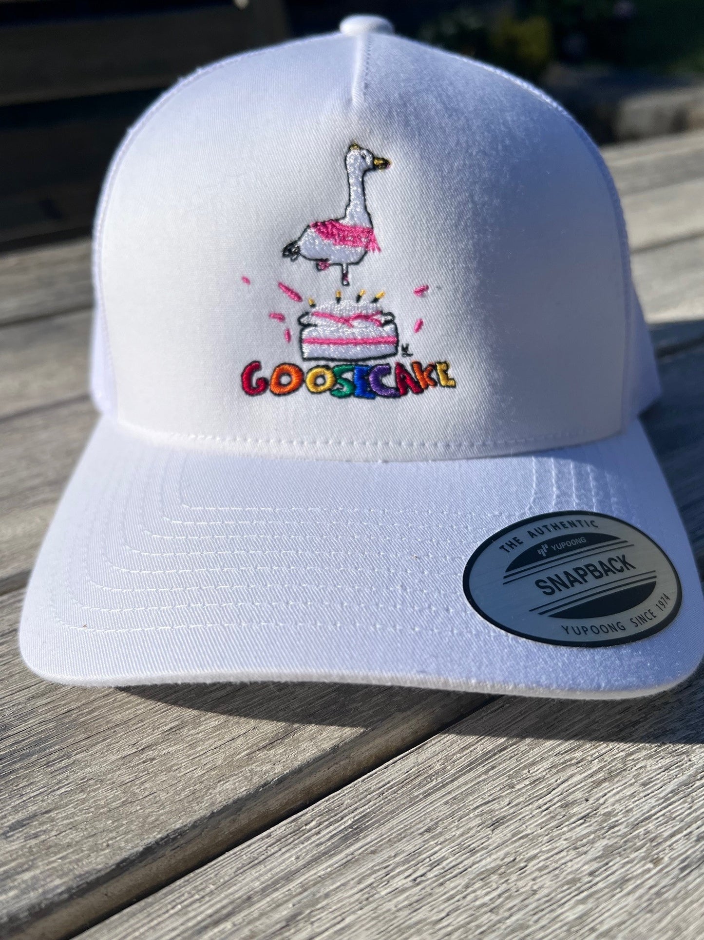 White Goosecake Trucker Hat